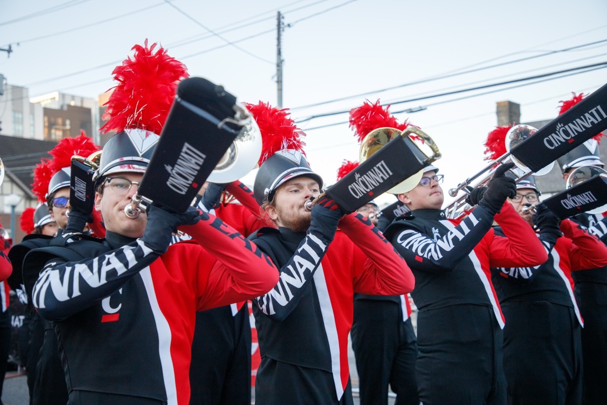 University of Cincinnati Bearcat Marching Band performing in Cotton Bowl uniforms